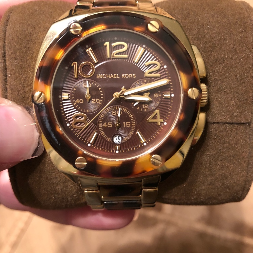 Michael Kors gold and tortoise design